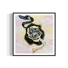 Framed artwork with a black and gold abstract swirls coming out of golden eye on a night sky over a pastel pink and yellow sky background