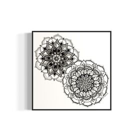 Framed artwork of two black and white mandala flower designs on a white background