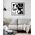 Abstract black and white artwork with swirling patterns, circle, and whimsical linework on a white background