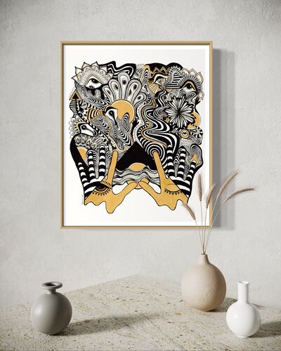Framed abstract artwork with black, white, and gold designs coming out of two gold hands and fine linework on a white background