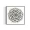 Black and white mandala art print in a black frame on a white background